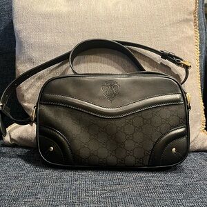 Gucci Black leather and canvas shoulder or crossbody bag